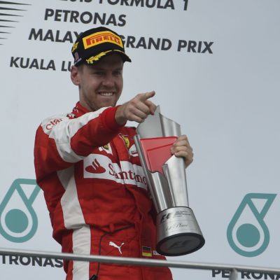 Vettel auf dem Siegerpodest in Malaysia. Copyright: Ferrari