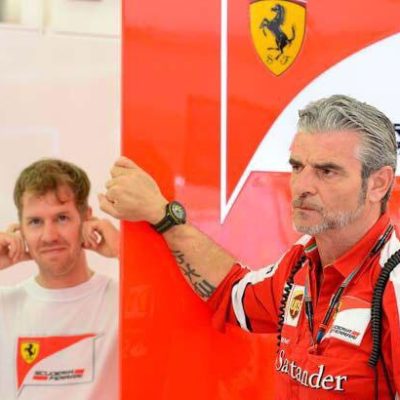 Ferrari-Teamchef Arrivabene und Vettel. Copyright: Ferrari