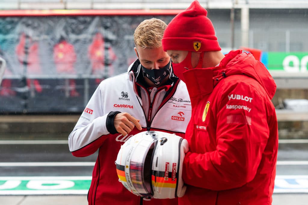 Sebastian Vettel with Mick Schumacher. Credit: @Scuderia Ferrari Press Office